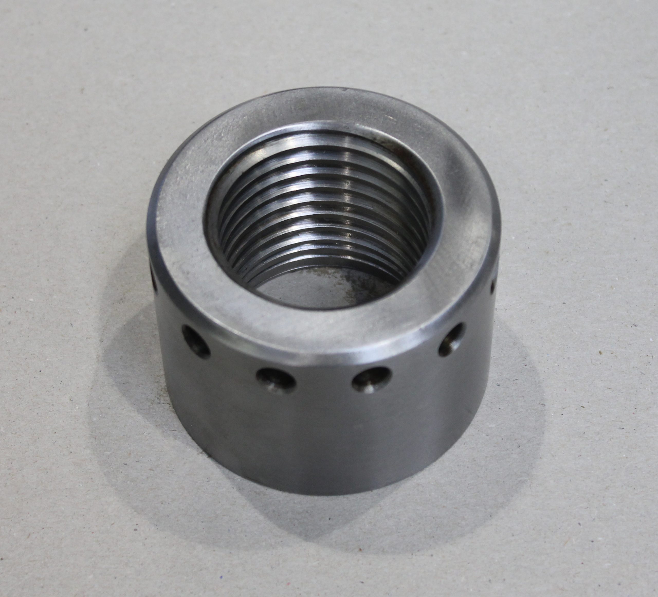 Nut for cylinder head screw